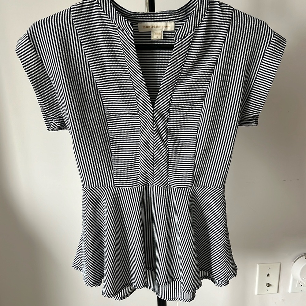 Blue and white flared blouse